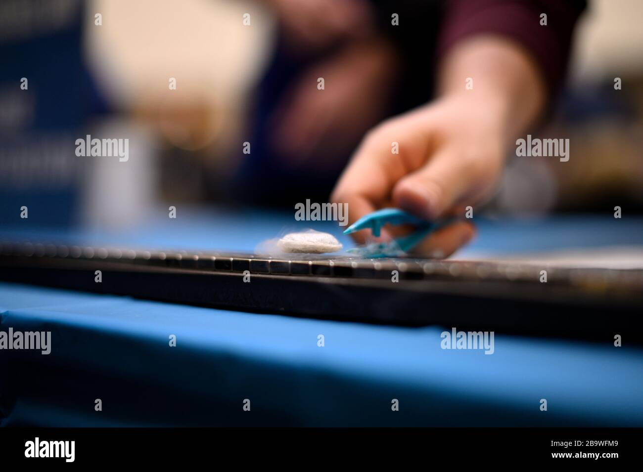 Magnetic levitation is demonstrated with a STEM experiment at a science festival. Stock Photo