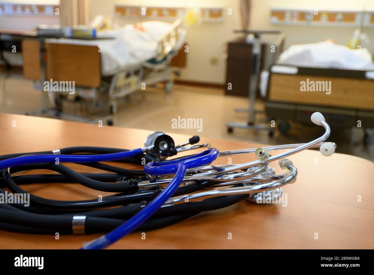 Stethoscopes lay in an education lab used for training situations at the Delaware County Technical School Practical Nursing Program, in Broomall, PA, Stock Photo