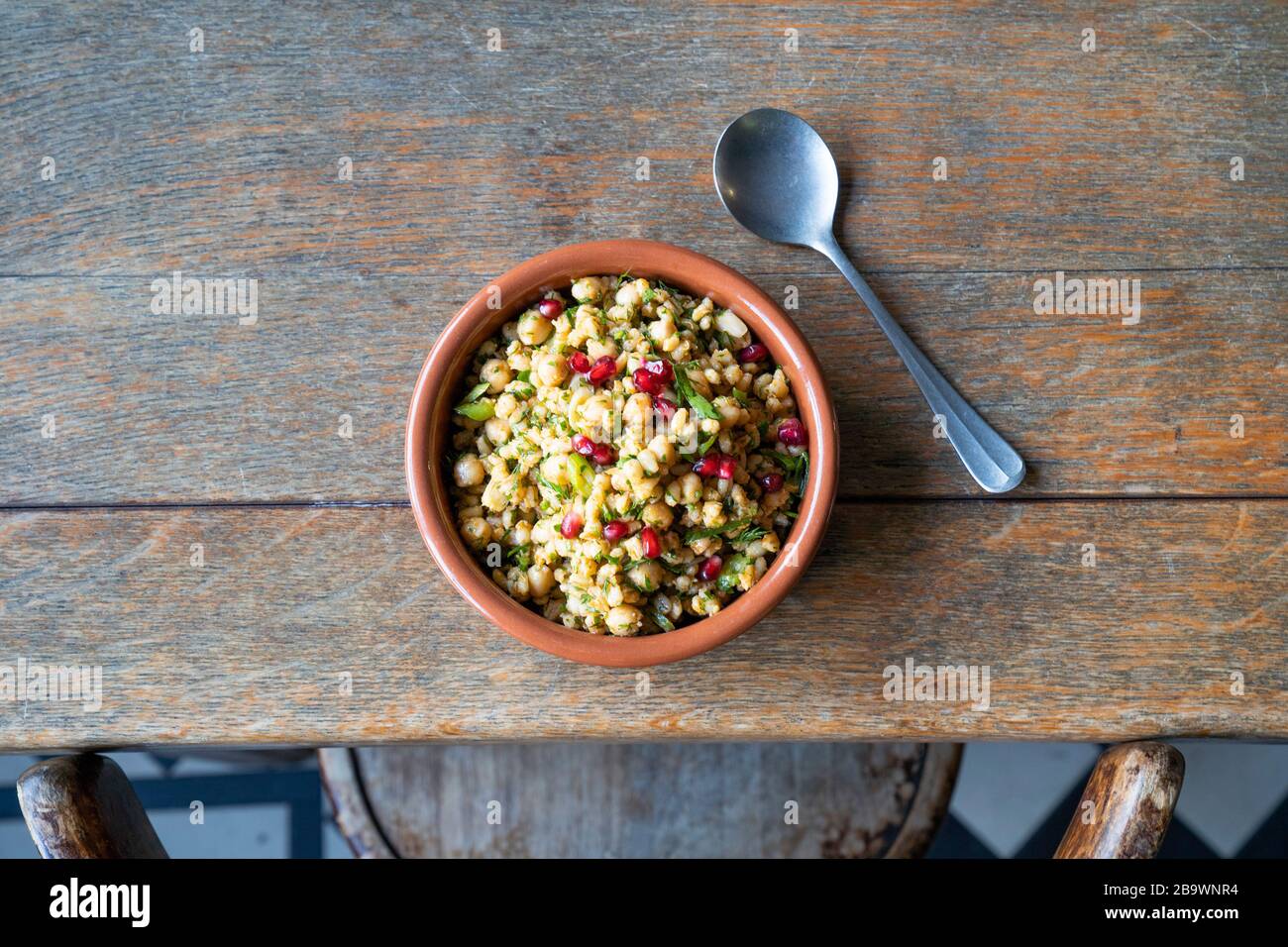 Bulgar wheat and chickpea pilaf with dill Middle Eastern salad Stock Photo