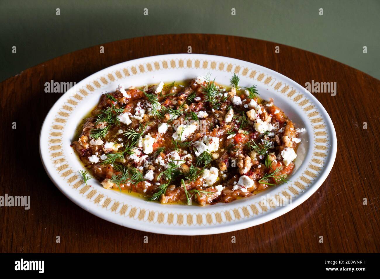 Turkish meze Soslu Patlican smoked aubergine salad to share Stock Photo
