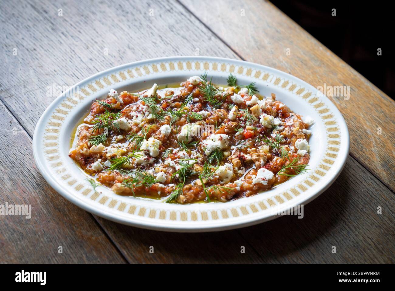Turkish meze Soslu Patlican smoked aubergine salad to share Stock Photo