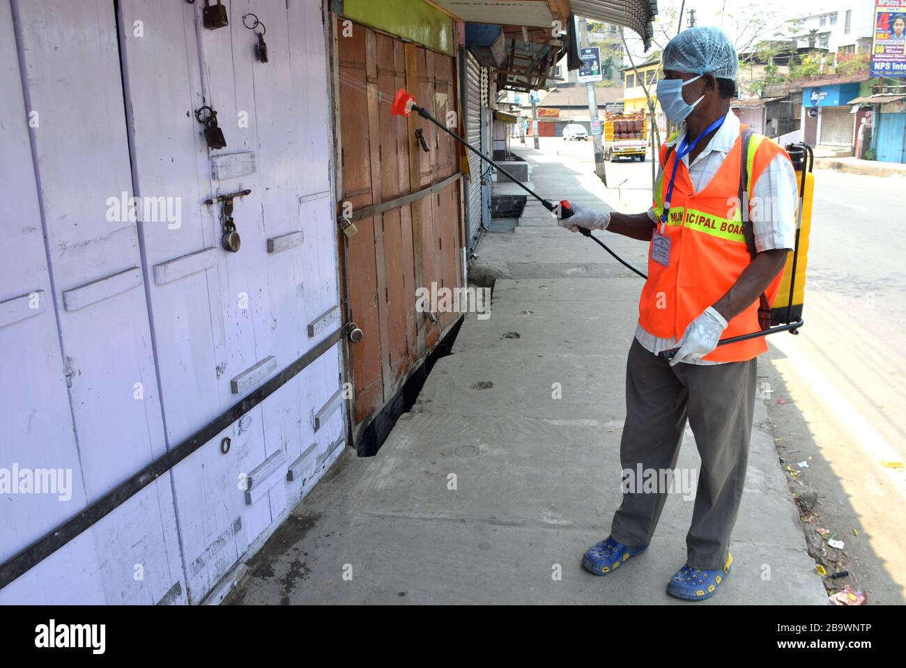 Nagaon / India - Health worker busy in spraying disinfectant during the Lock down called by the government for outbreak of Corona Virus in India. Stock Photo