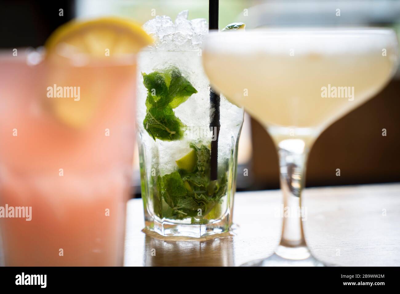 Mojito cocktail in trendy bar, geometric background. Stock Photo