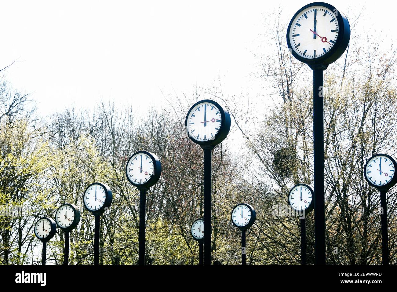 Controversial weekend time change. Clock installation Zeitfeld by Klaus Rinke at the northern entrance of the Volksgarten in Düsseldorf. Stock Photo