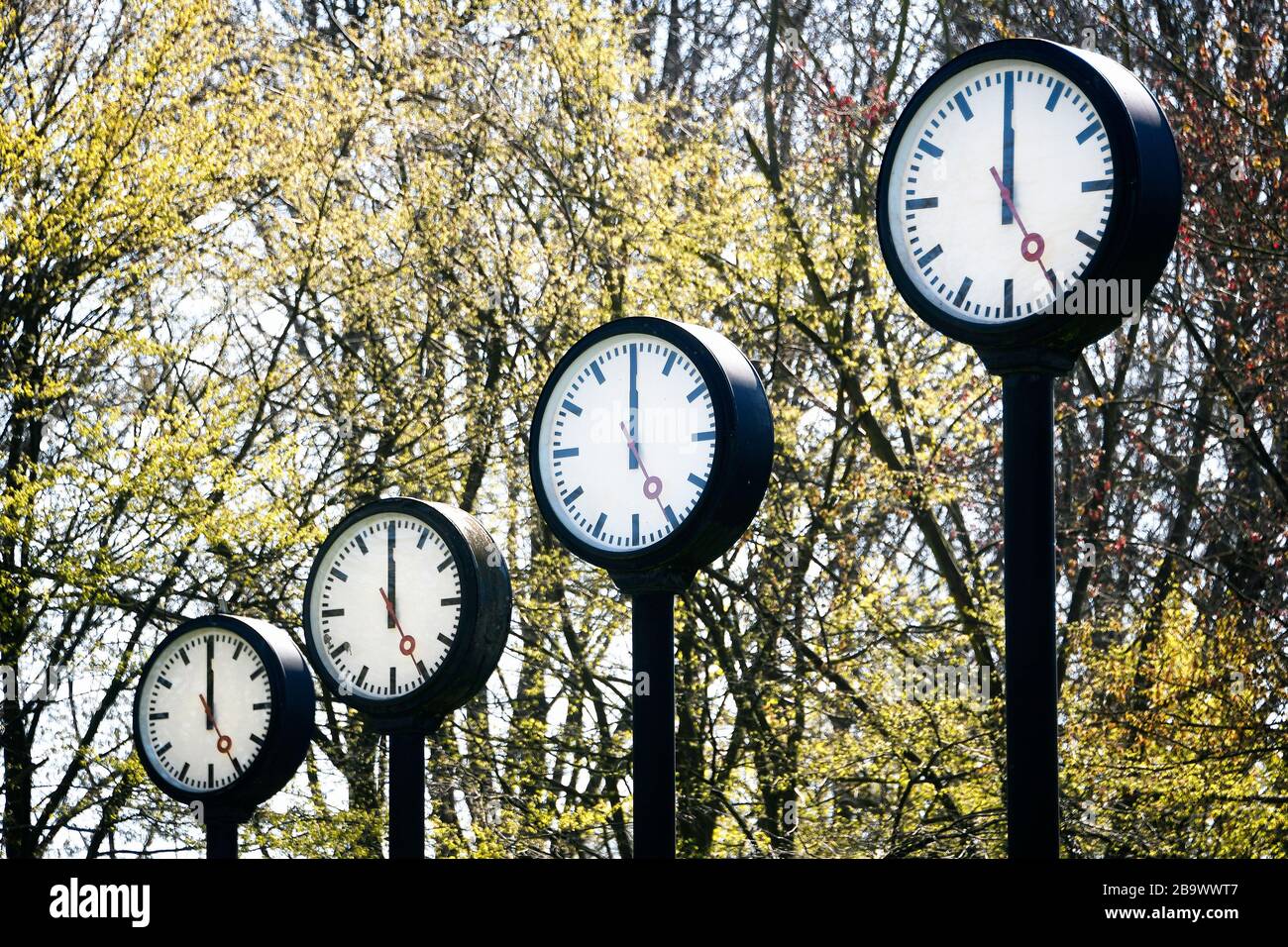 Controversial weekend time change. Clock installation Zeitfeld by Klaus Rinke at the northern entrance of the Volksgarten in Düsseldorf. Stock Photo