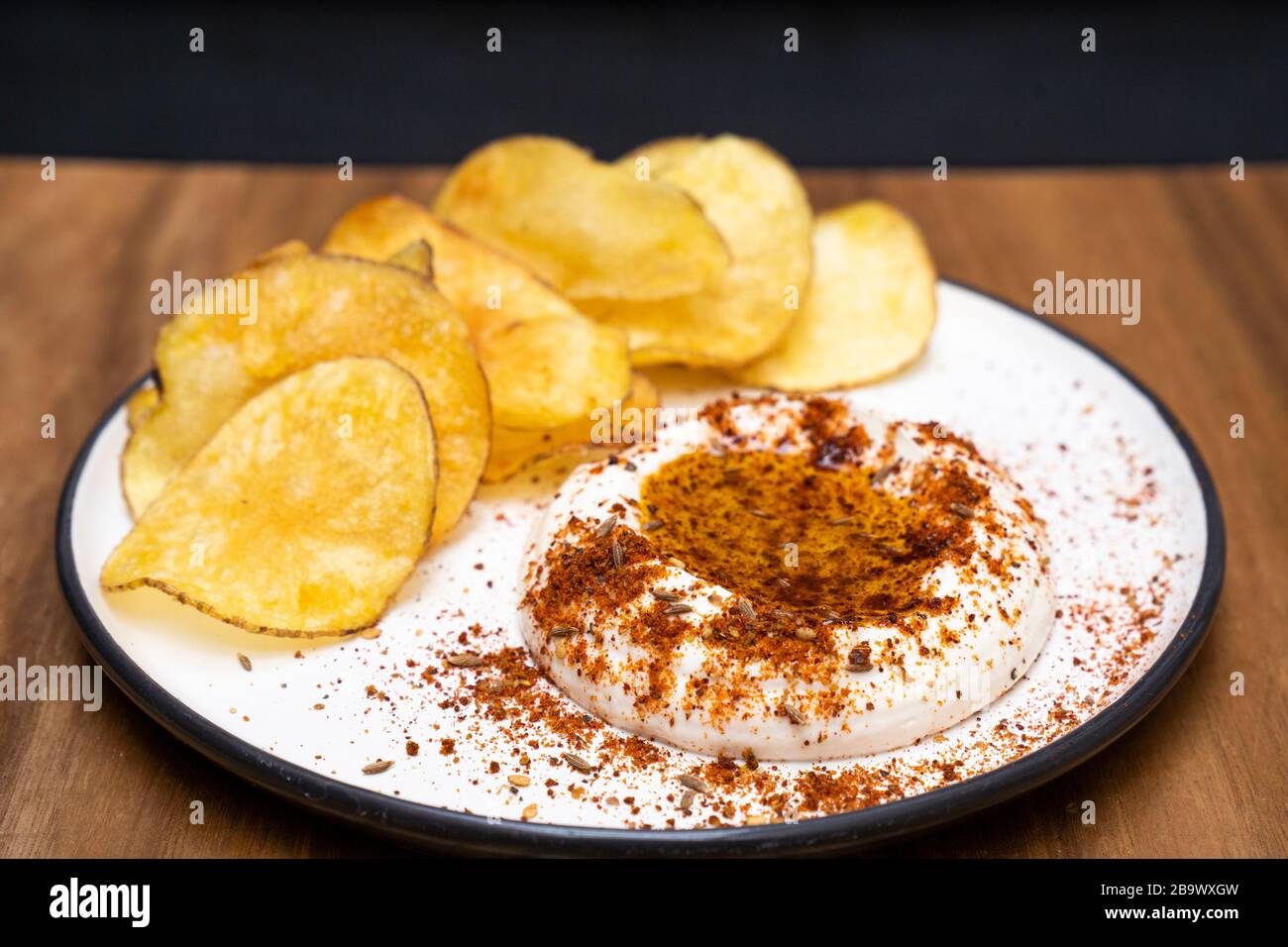 Taramasalata with baharat Middle Eastern spice mix and crisps Stock Photo