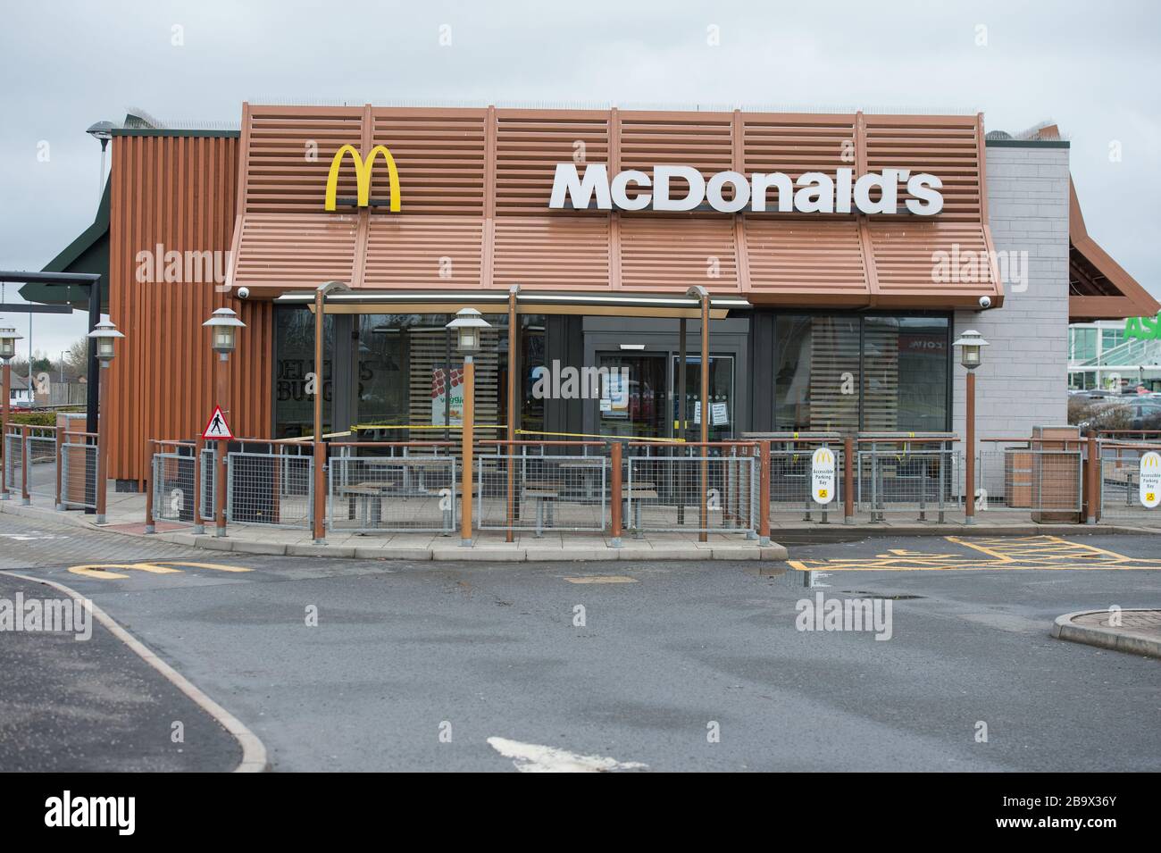 Glasgow, UK. 25th Mar, 2020. Pictured McDonald's Restaurant in