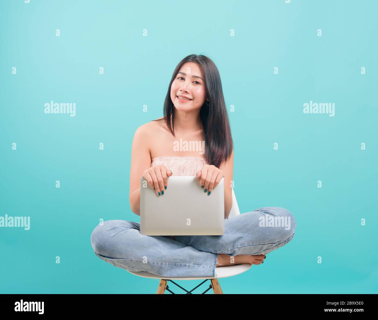 Asian happy portrait beautiful young woman sitting on chair smile her ...