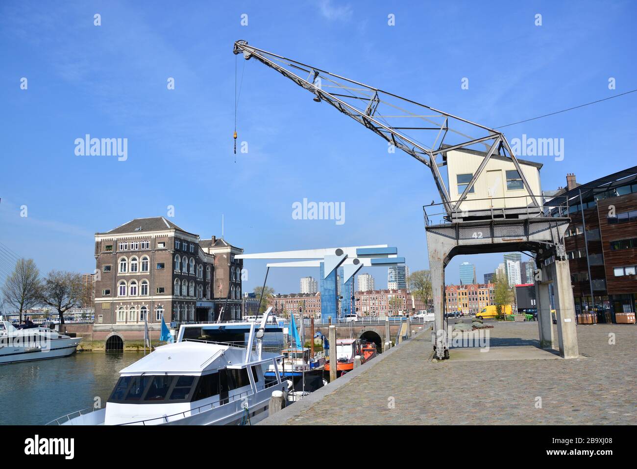 Historic Entrepot harbour of Rotterdam; former harbor and poortgebouw restored in old glory in combination with urban living and marina Stock Photo