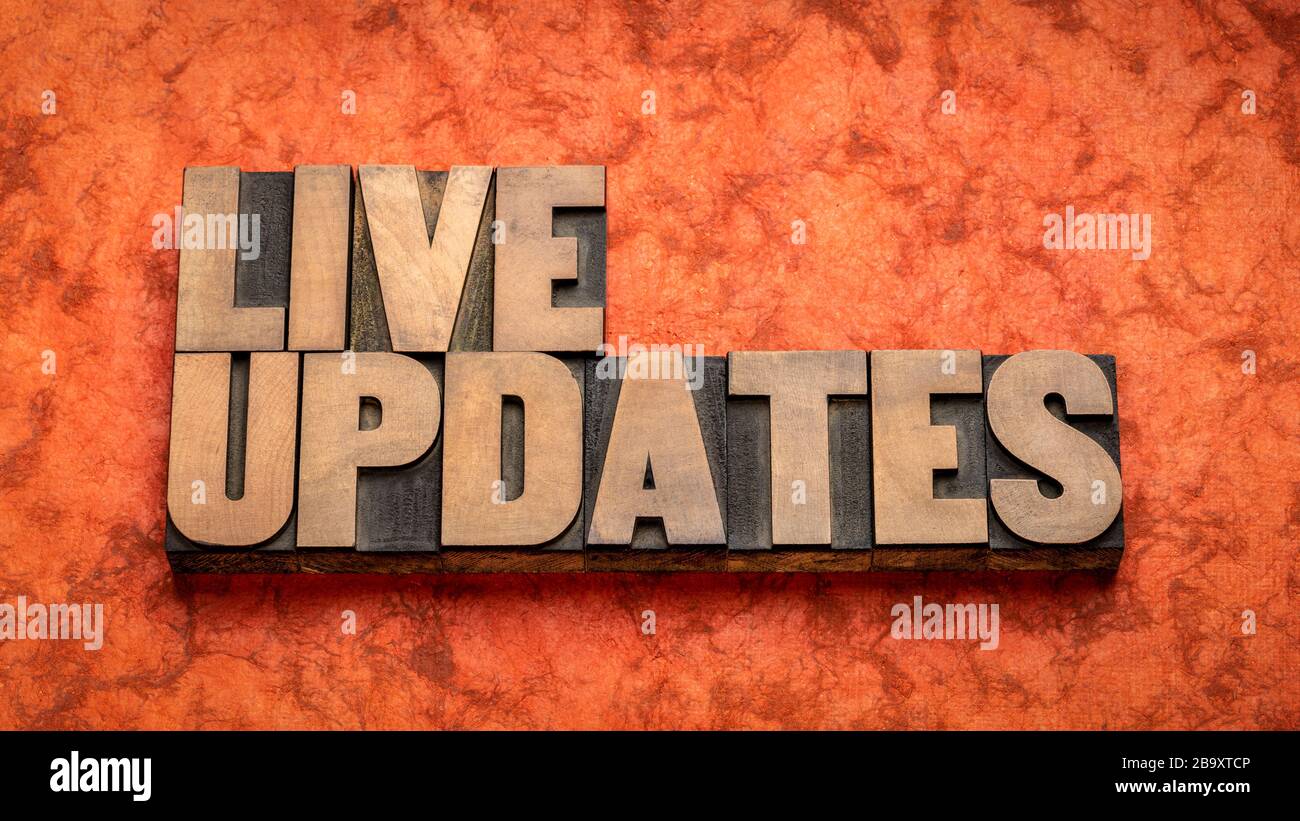 live updates word abstract in vintage letterpress wood type, media and communication concept Stock Photo