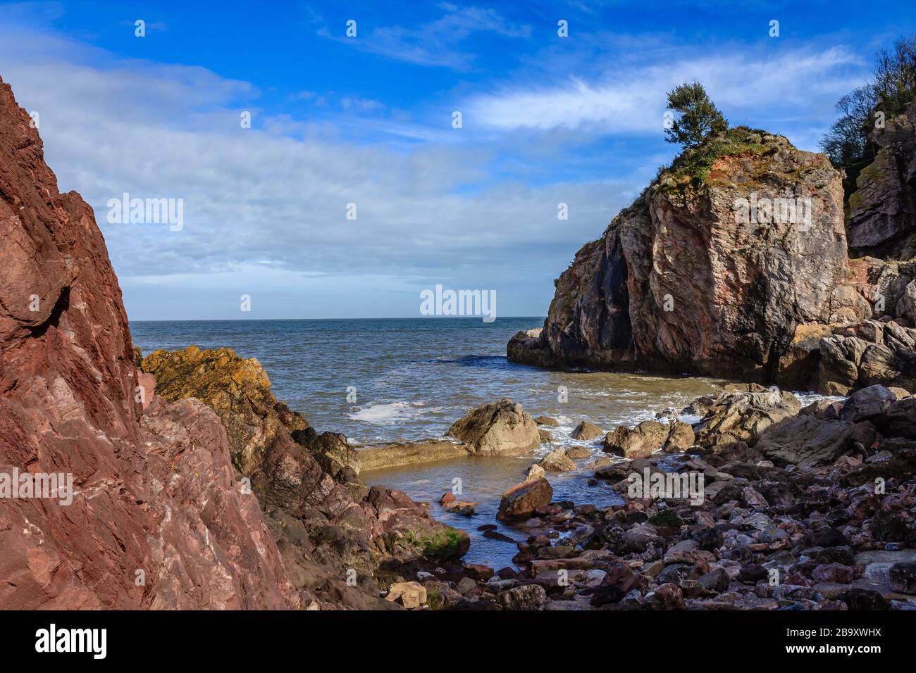 Rocks at Babbacombe Beach, a secluded bay at Babbacombe, Torquay, Devon, UK. March 2018. Stock Photo