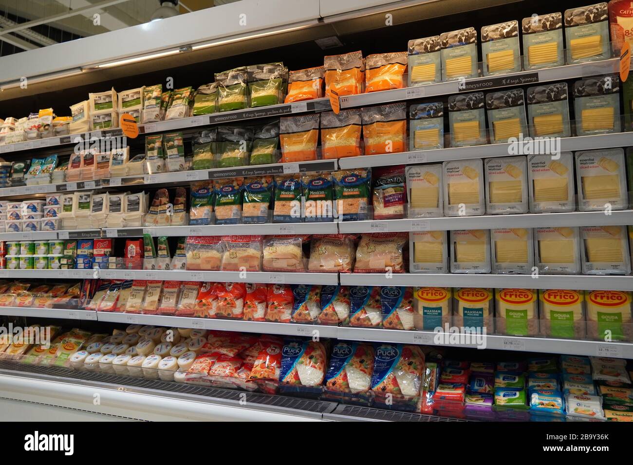 Dubai UAE December 2019 Different types of cheese on shelves in a