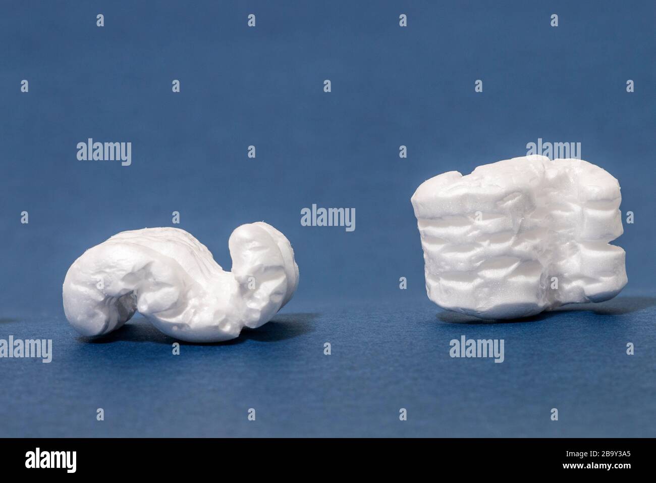 Polystyrene or white styrofoam packing pieces used for minimize bumps ...