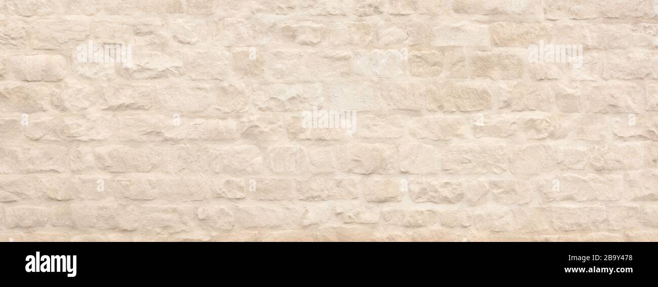 Plastered old natural stone wall Stock Photo