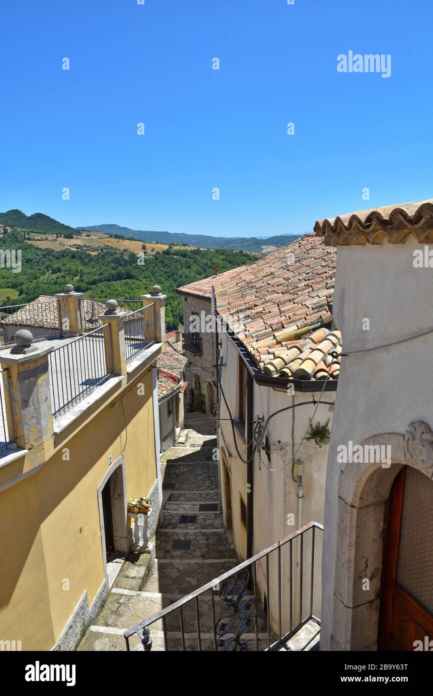 A narrow street among the old zungoli houses, a medieval village in the