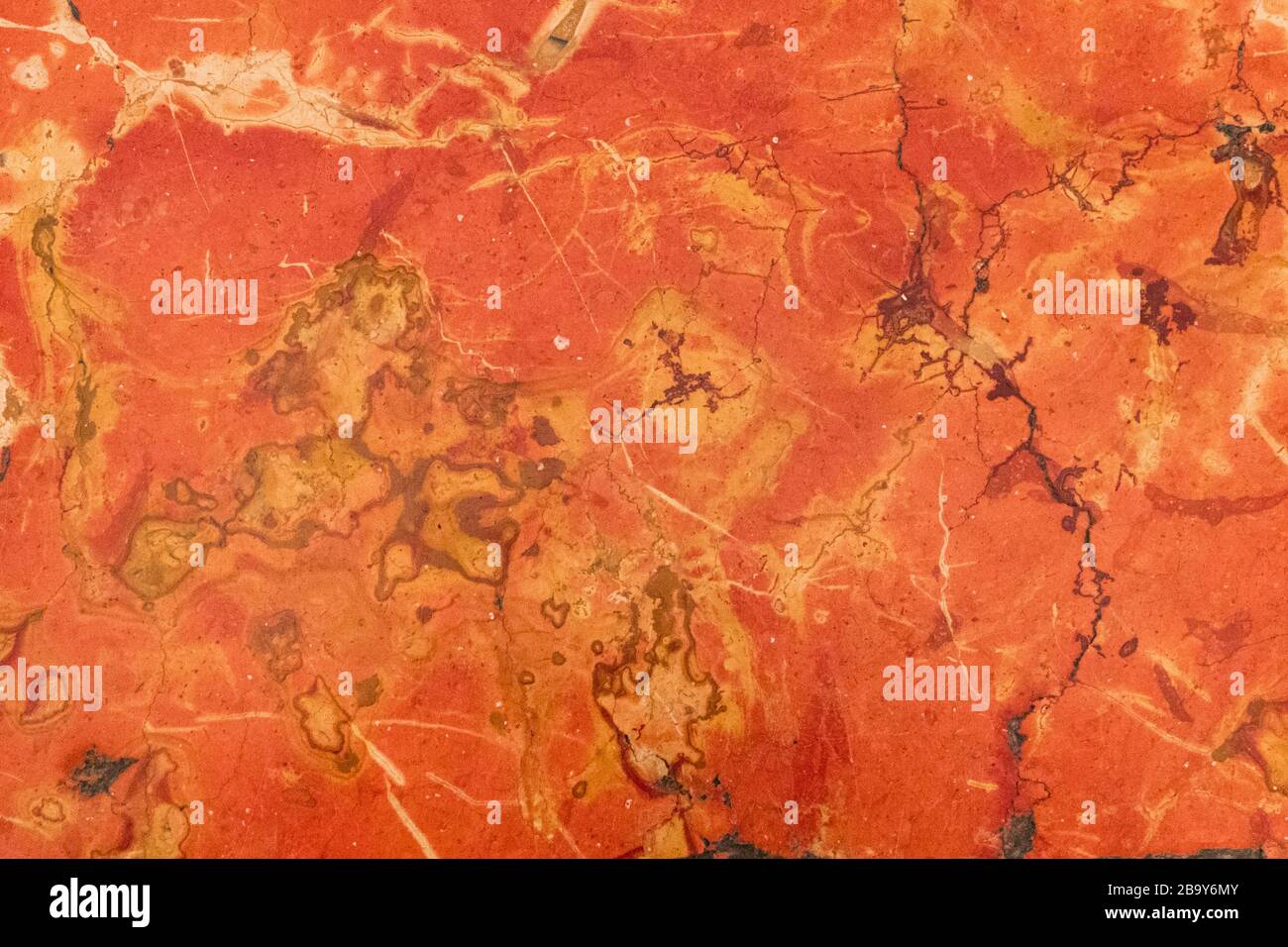 Red, orange and yellow marble texture. Stone background seamless pattern Stock Photo