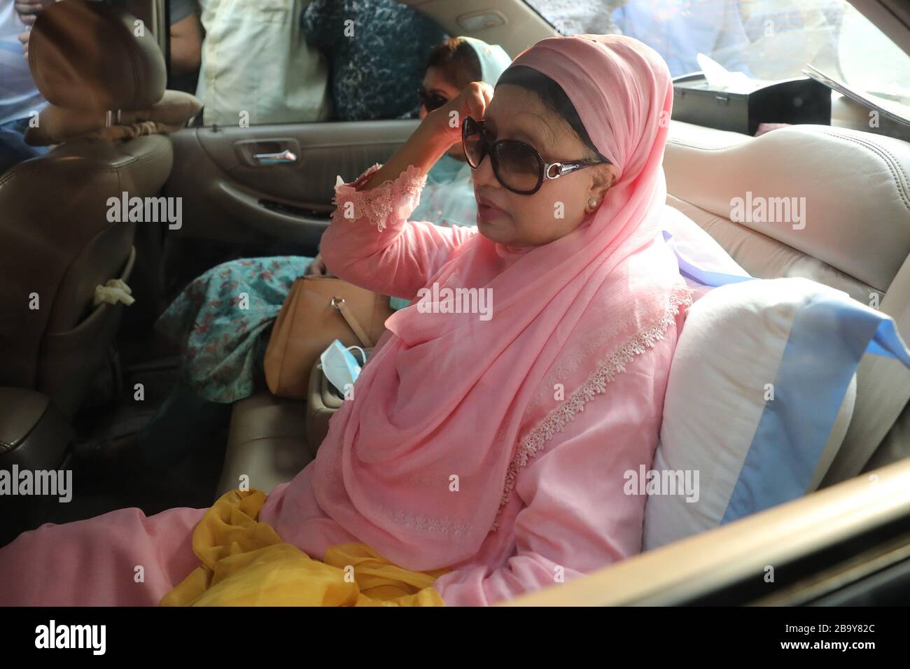 (200325) -- DHAKA, March 25, 2020 (Xinhua) -- Bangladeshi ex-Prime Minister Khaleda Zia leaves the Bangabandhu Sheikh Mujib Medical University (BSMMU) in Dhaka, Bangladesh, March 25, 2020. Khaleda Zia has been released from jail for six months on humanitarian grounds in light of the COVID-19 outbreak in the country. Zia, also chairperson of Bangladesh Nationalist Party (BNP), at around 4:15 p.m. local time on Wednesday, came out of Bangabandhu Sheikh Mujib Medical University (BSMMU) in capital Dhaka, where she was being treated. In April 2018, Zia was shifted to the BSMMU when she fell Stock Photo