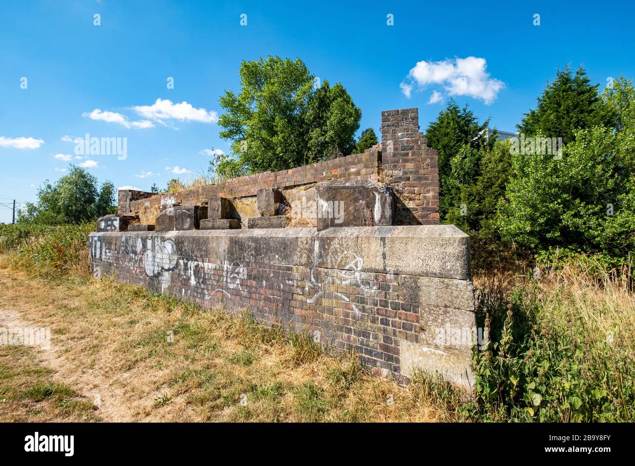 Remains of bridge foundation on the Trent and Mersey canal in Moston Sandbach Cheshire UK Stock Photo