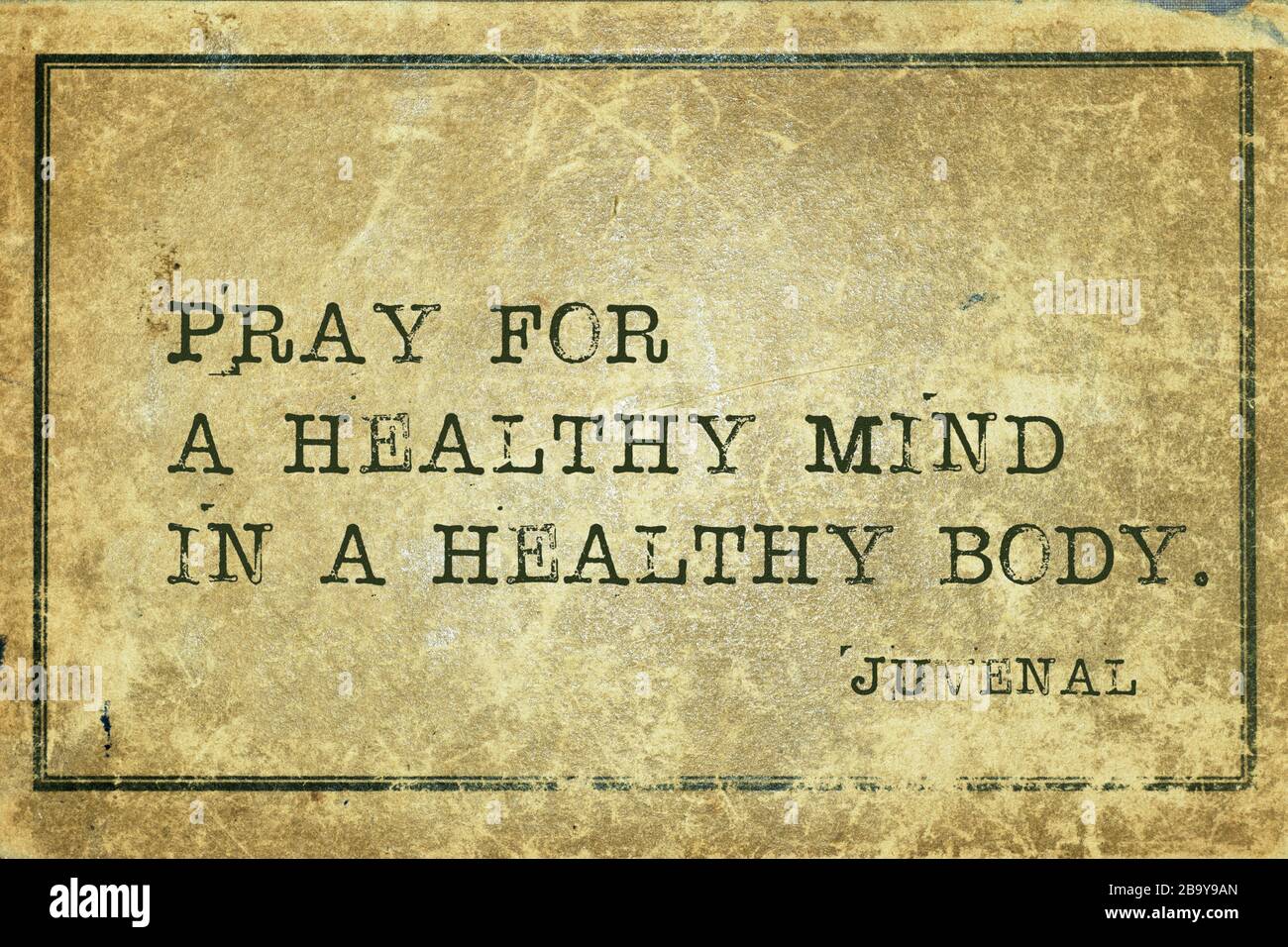 Pray for a healthy mind in a healthy body - ancient Roman poet Juvenal quote printed on grunge vintage cardboard Stock Photo