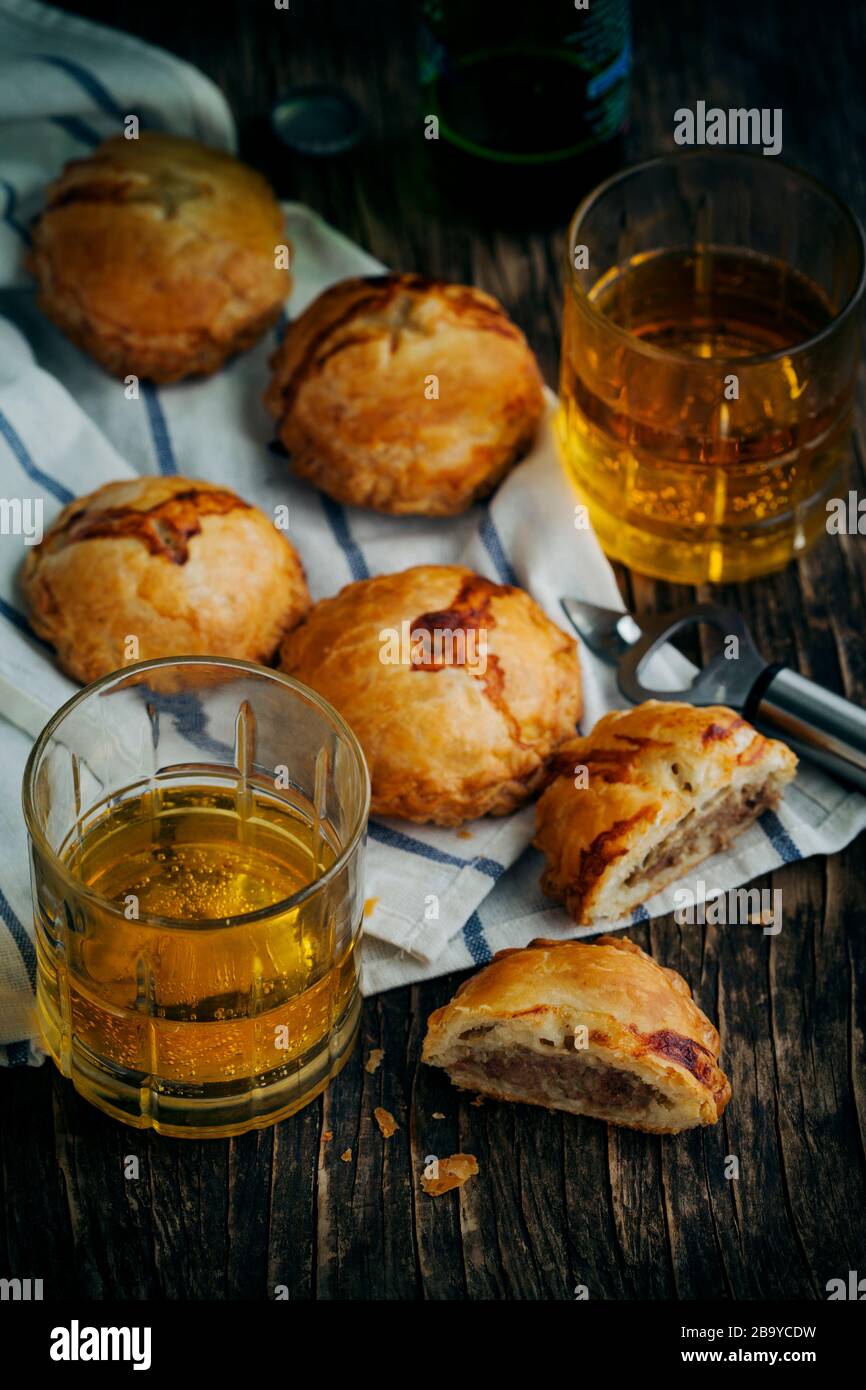 Puff pastry pies with mince meat. Toned image Stock Photo - Alamy