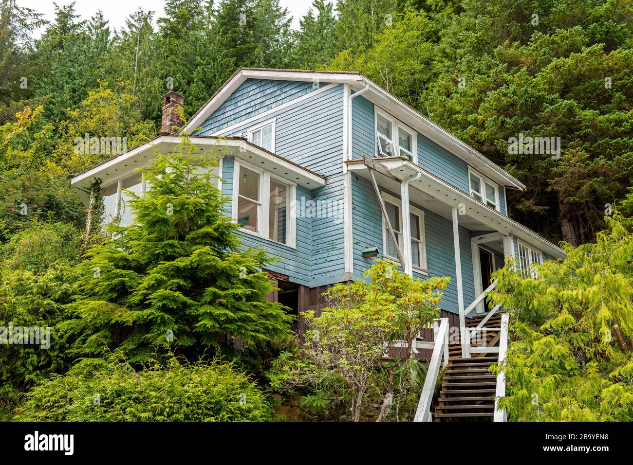 Housing in Telegraph Cove with wooden chalet style architecture on stilts in the woods, Vancouver Island, British Columbia, Canada. Stock Photo