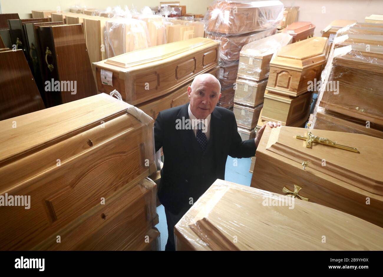 Dom Maguire from Anderson Maguire Funeral Directors in the empty coffin