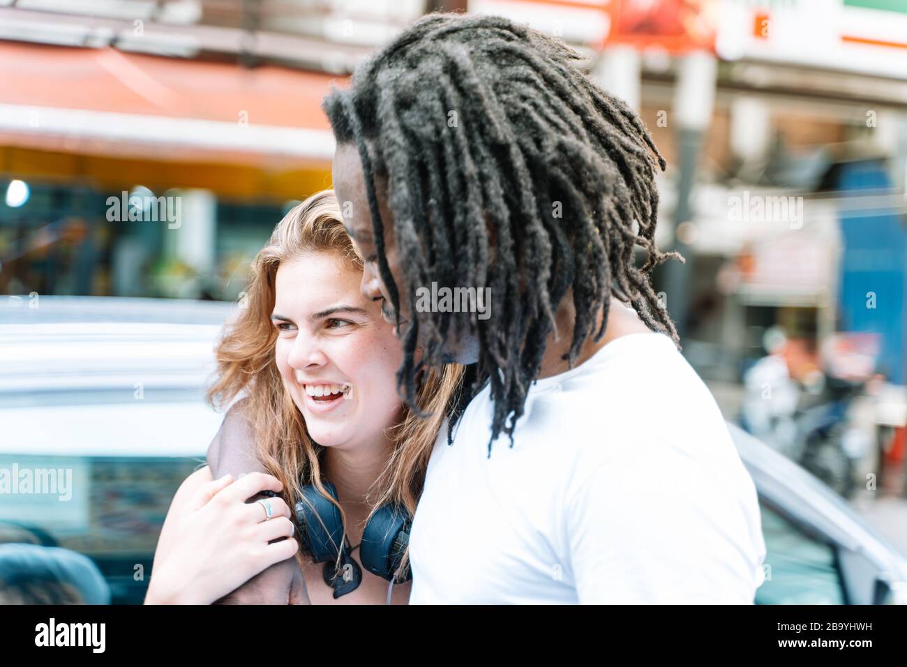 Couple with dreadlocks hugging hi-res stock photography and images - Alamy