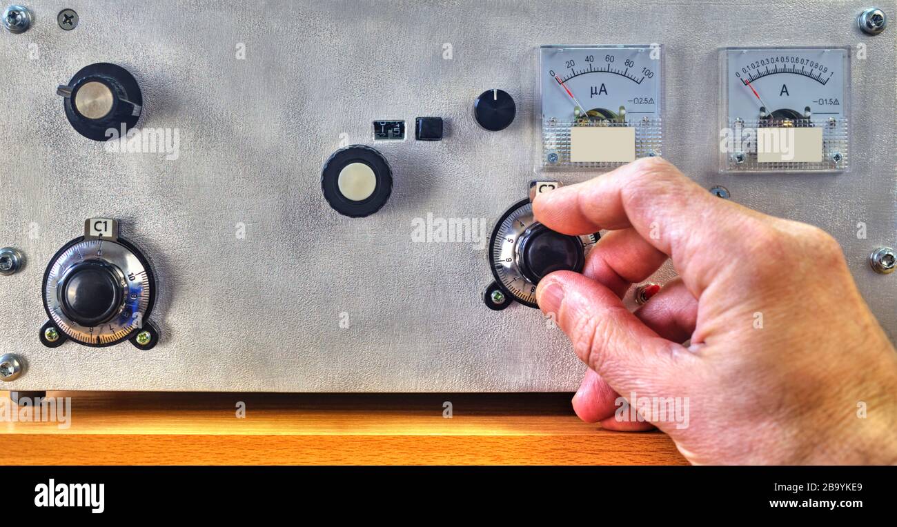 Radio amateur tuning the high frequency power amplifier close up view Stock Photo