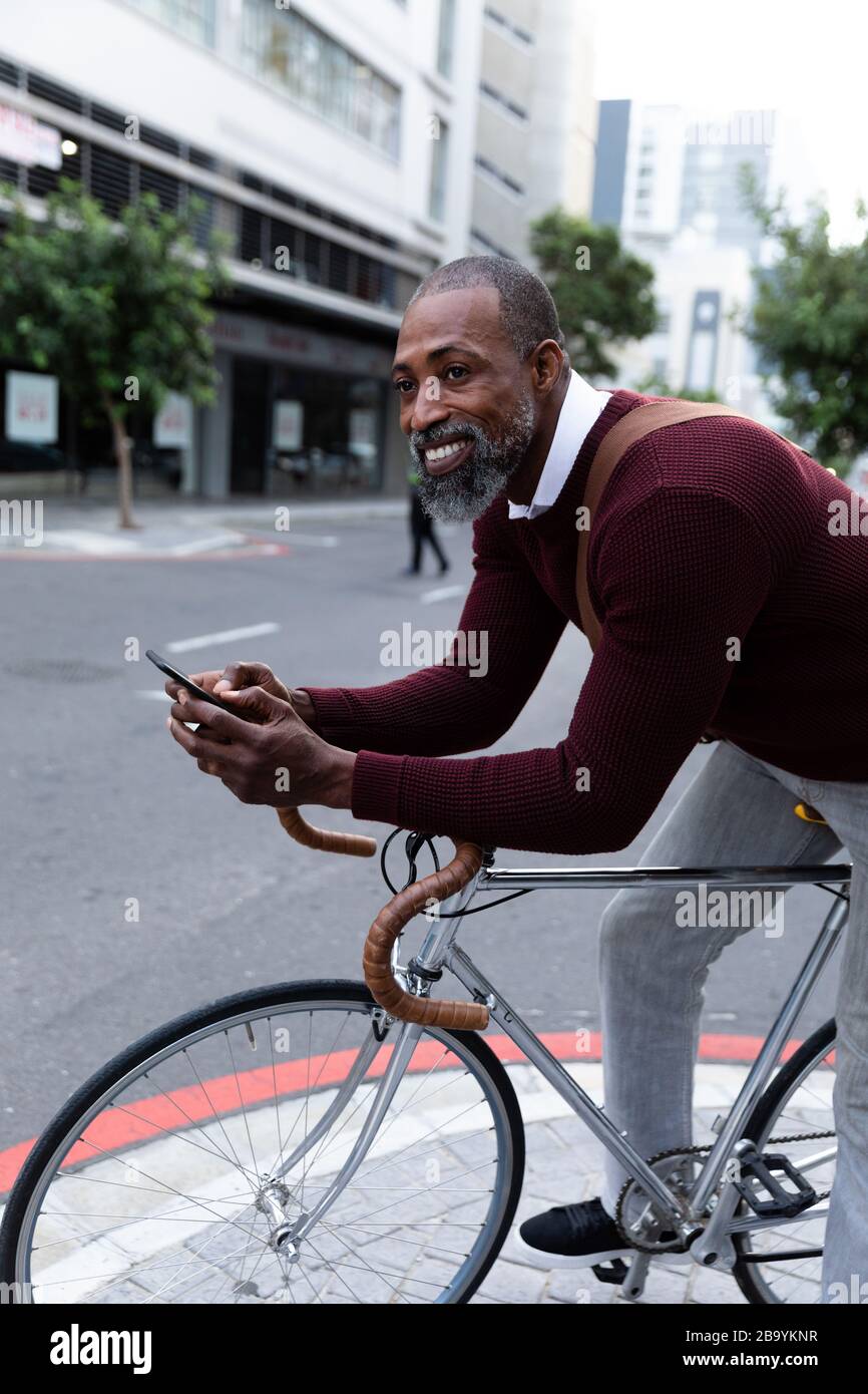 Black man riding a bike hi-res stock photography and images - Alamy