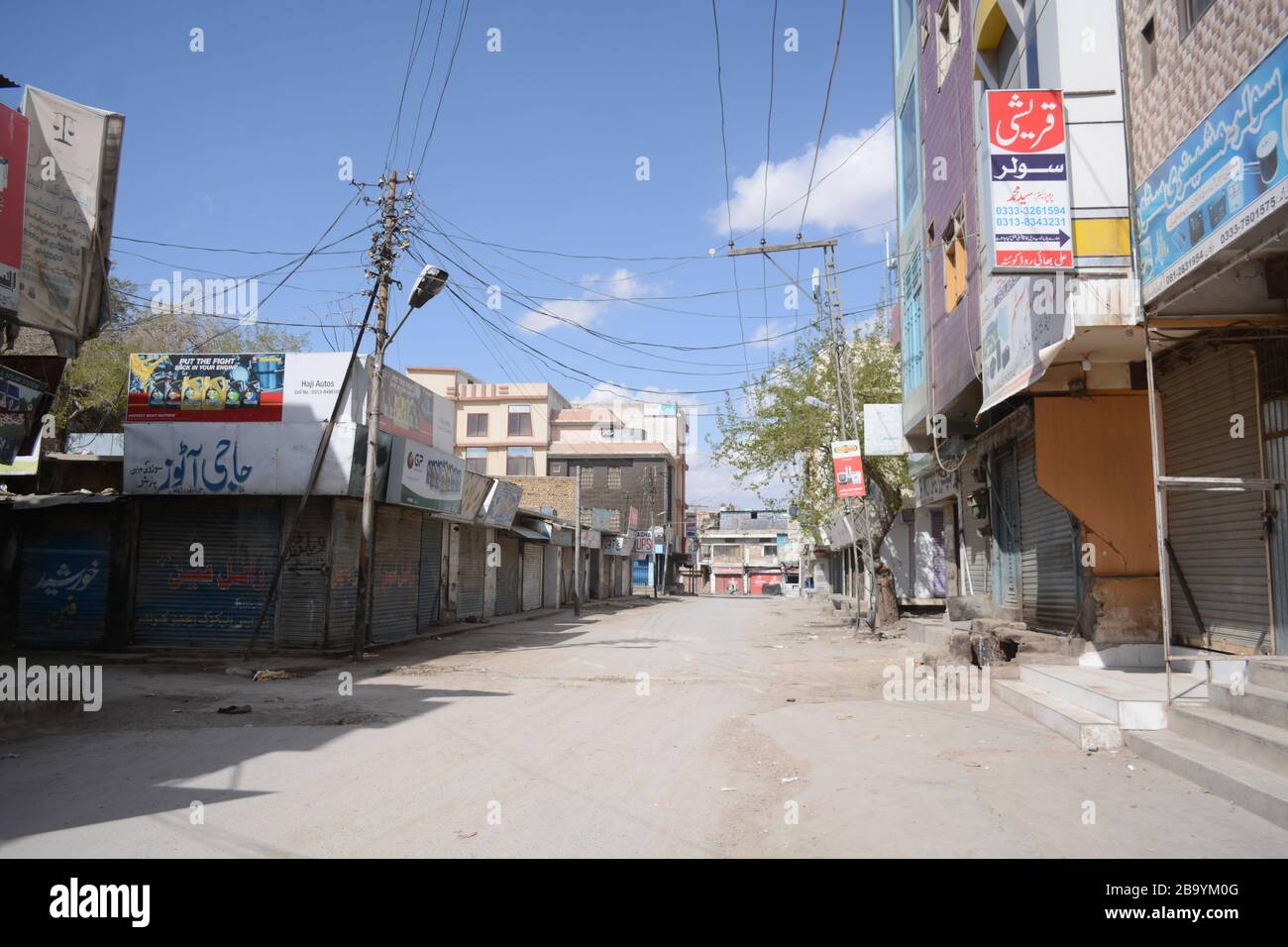Quetta, Pakistan. 25th Mar, 2020. Road of Quetta is deserted during partial lock-down in Balochistan. Due to COVID-19 all markets are closed during lockdown implement by Pakistan government. (Photo by Din Muhammad Watanpaal/ Pacific Press/Sipa USA) Credit: Sipa USA/Alamy Live News Stock Photo