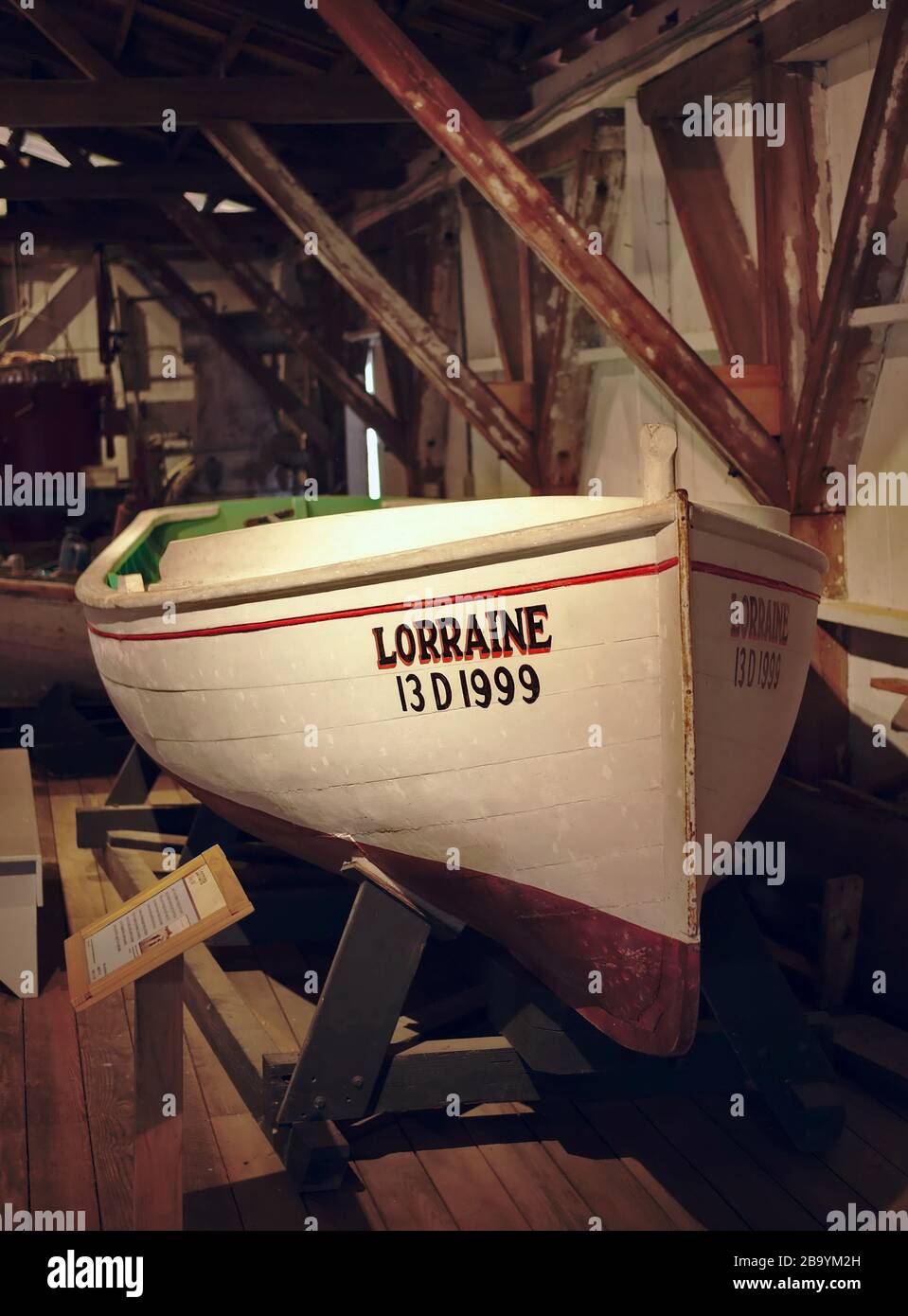 Restored boats on display in a boat barn. Chesapeake Bay Maritime