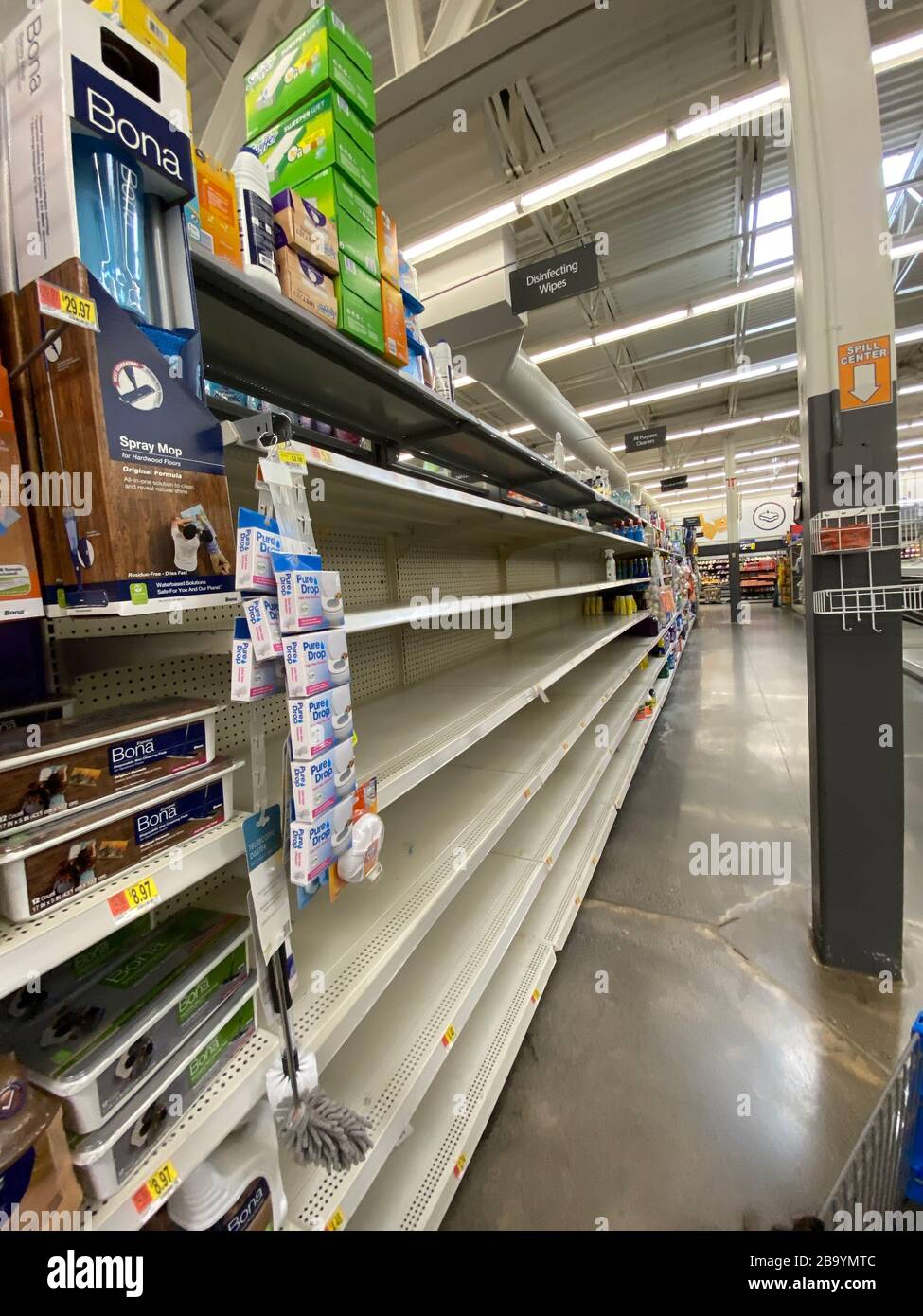 Empty shelves in Walmart Stock Photo
