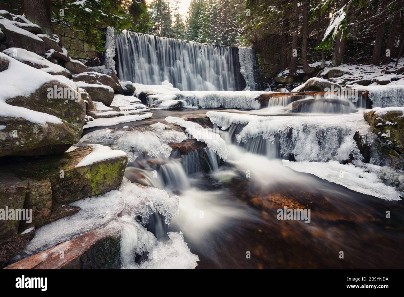 Karpacz, Poland. Winter view of Wild Waterfall (Dziki Wodospad) Stock Photo