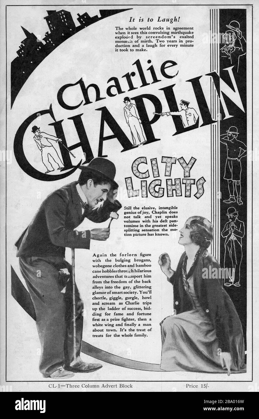 CHARLIE CHAPLIN as the Tramp and VIRGINIA CHERRILL as the Blind Girl in CITY LIGHTS 1931 written and directed by CHARLES CHAPLIN silent movie comedy with music score  Charles Chaplin Productions / United Artists Stock Photo