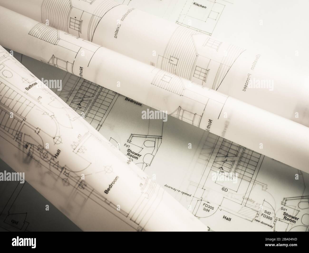 Rolls of building plans drawing designs Stock Photo