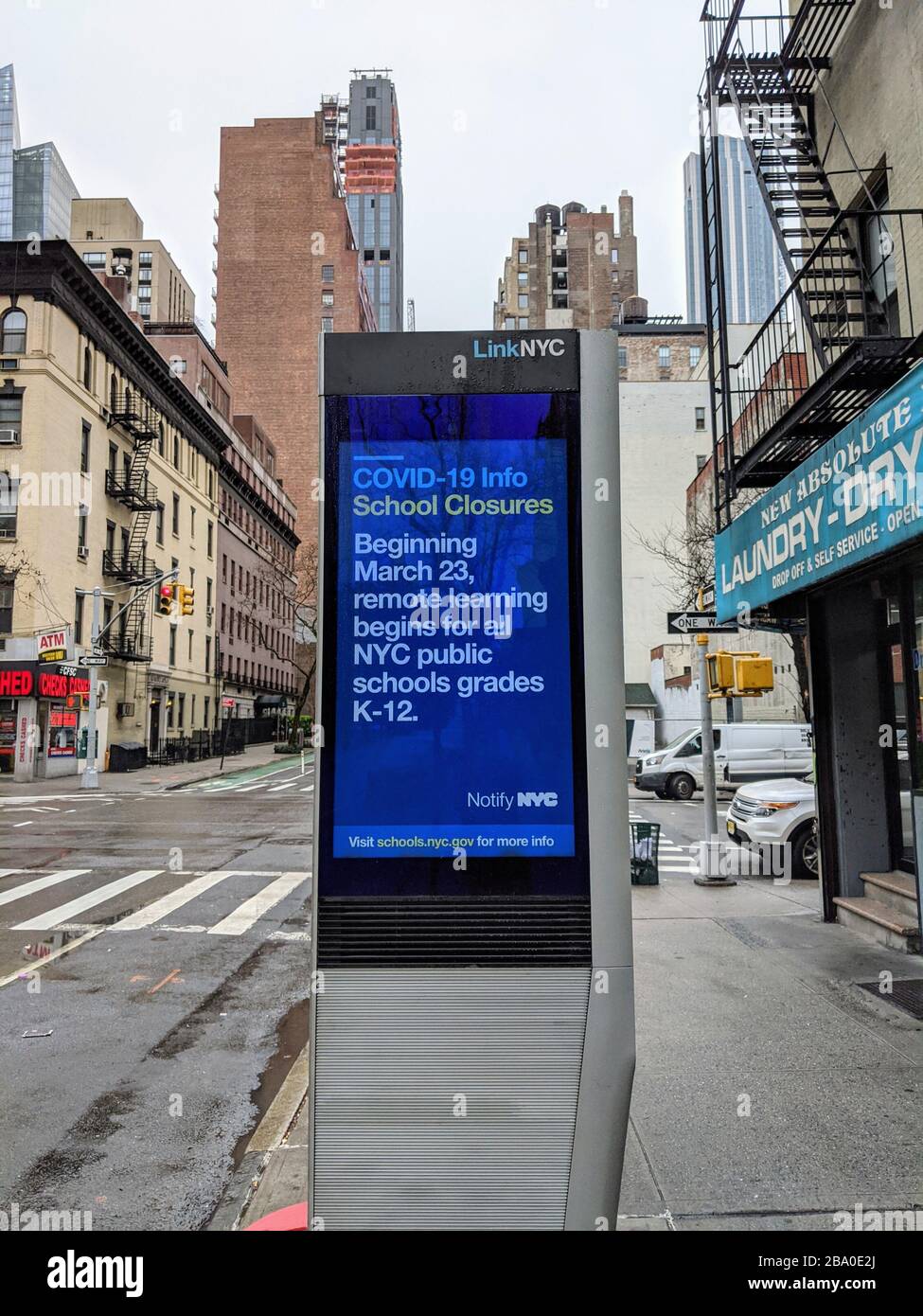 Sign in Midtown Manhattan giving updates on the coronavirus outbreak in New York City. Stock Photo