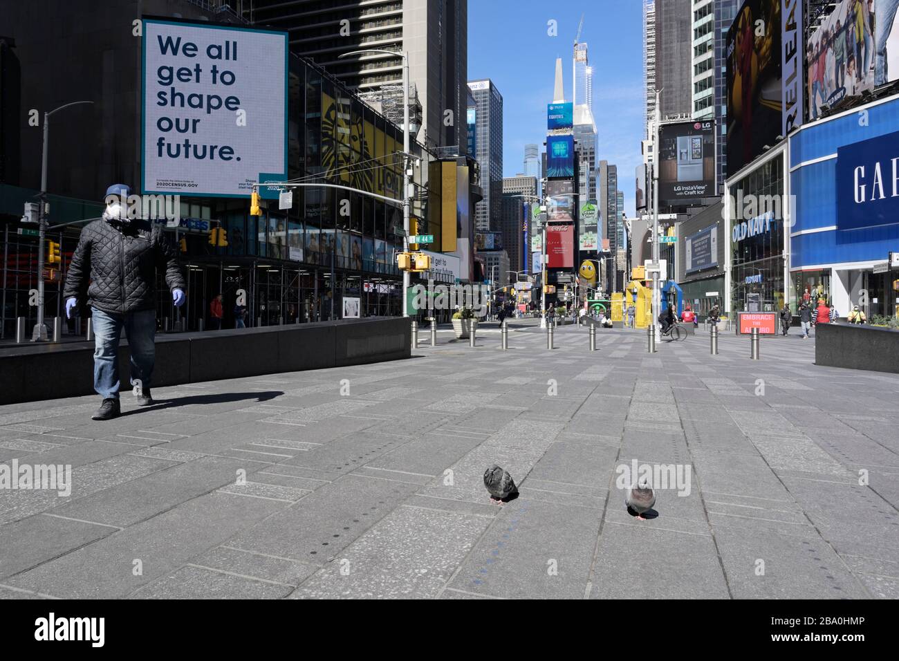 New York Times Square during Corona Virus outbreak quarantine mostly empty Stock Photo