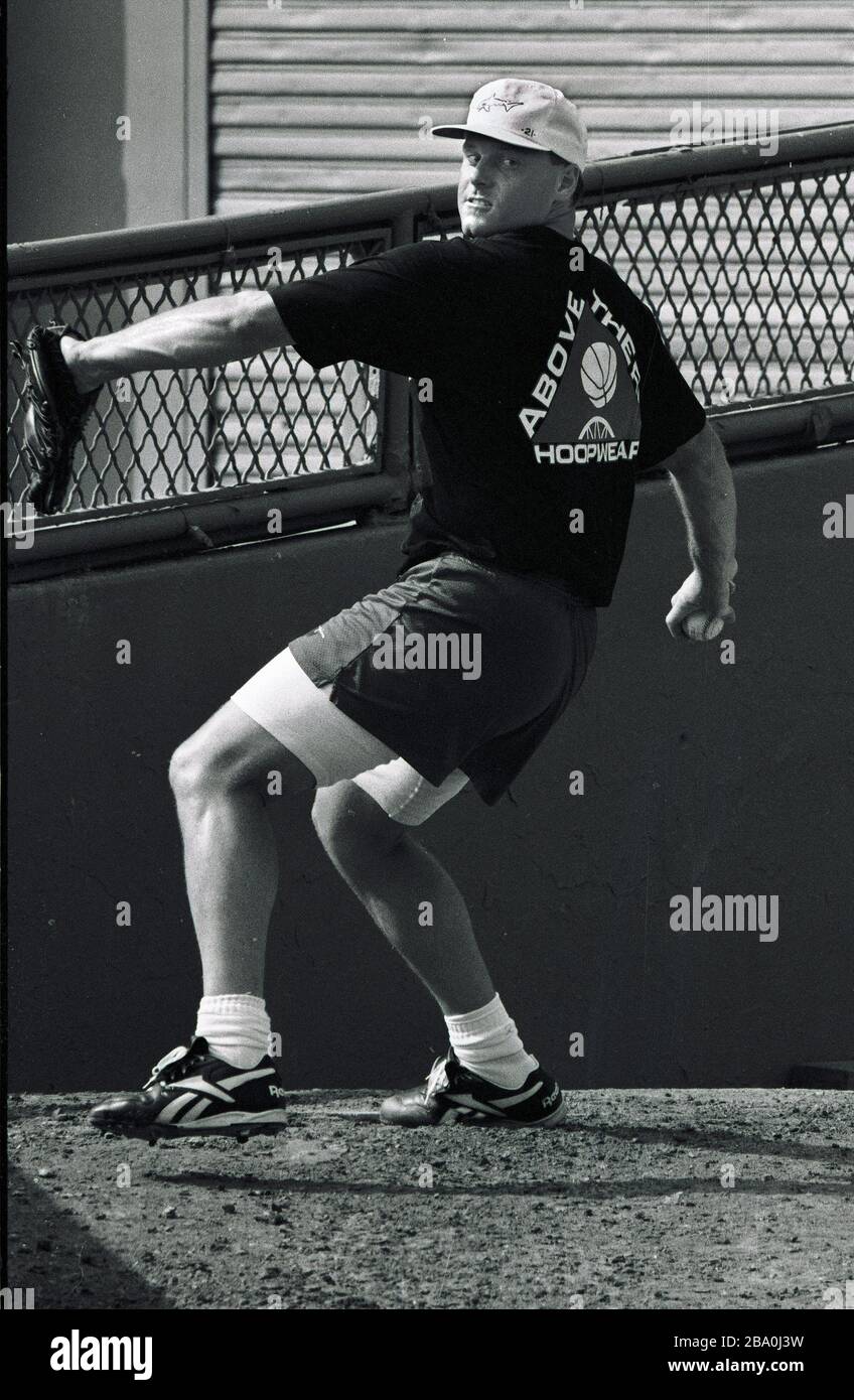 Red Sox pitcher Roger Clemens pracrices his pitching skills in the Red Sox bull pen during a day off at Fenway Park in Boston Ma USA exculsive photo by Bill Bellknap 1990’s Stock Photo