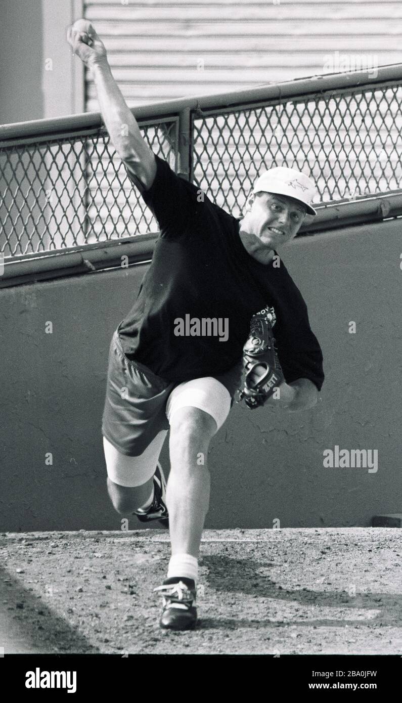 Red Sox pitcher Roger Clemens pracrices his pitching skills in the Red Sox bull pen during a day off at Fenway Park in Boston Ma USA exculsive photo by Bill Bellknap 1990’s Stock Photo