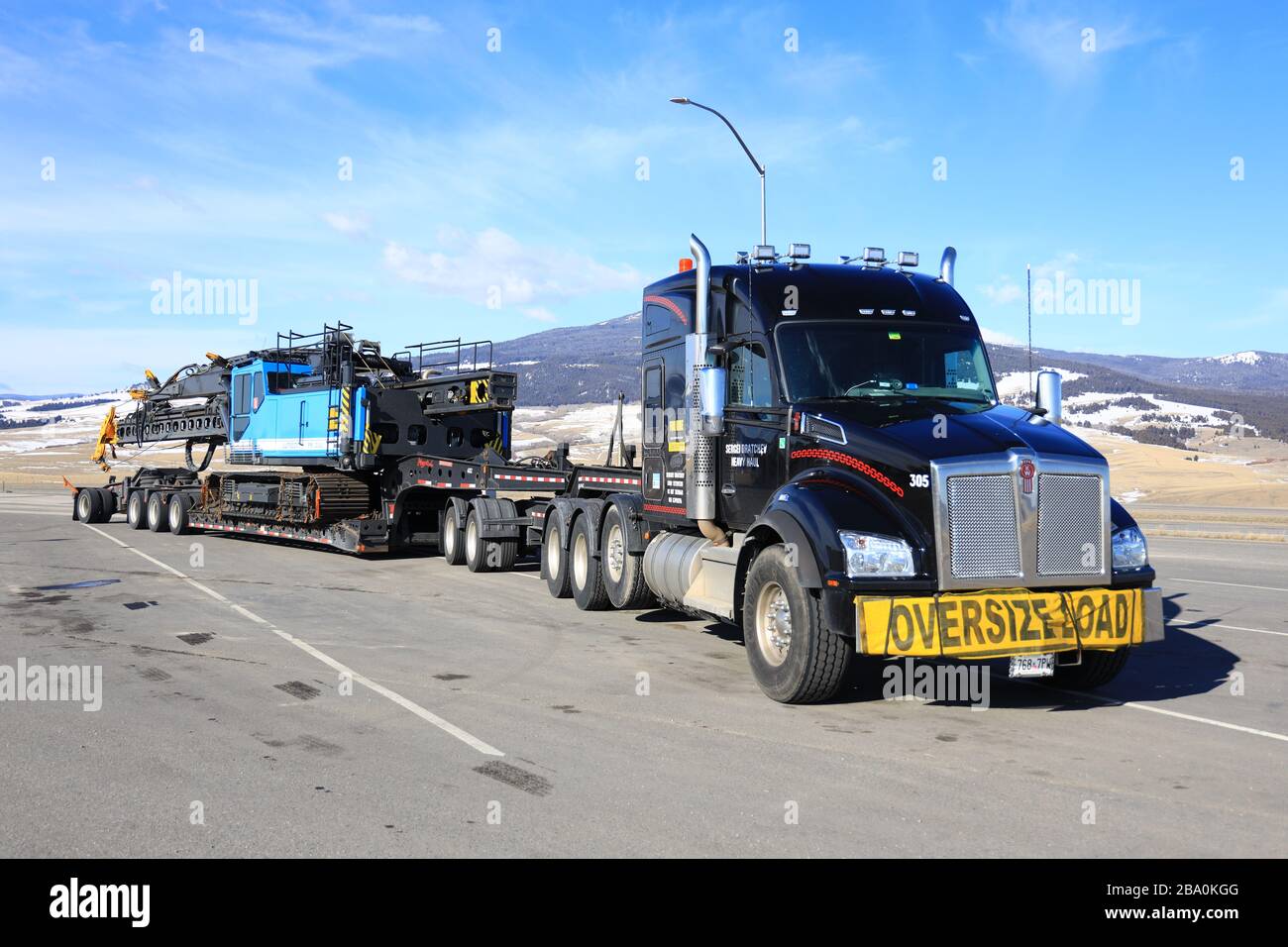 Heavy haul trucking on I-15 in Montana Stock Photo