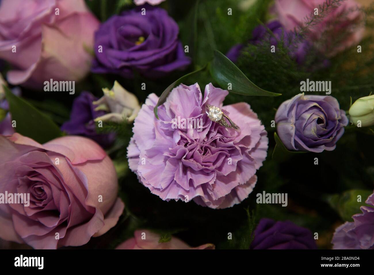engagement ring sitting in the brides bouquet on her wedding day - no people Stock Photo