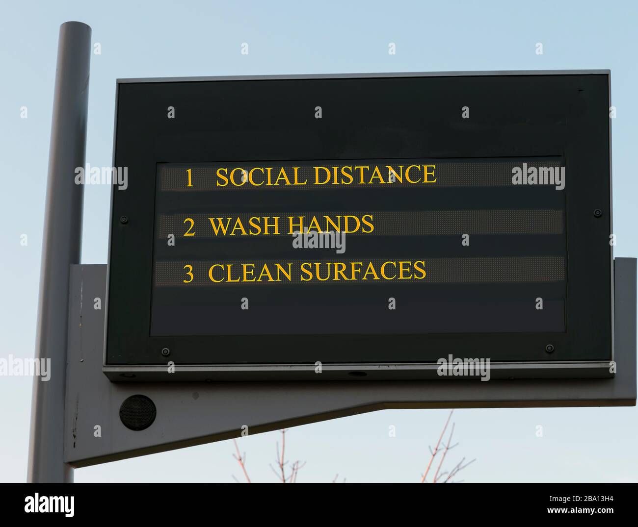 Bus station board billboard with three basic rules to avoid the coronavirus or Covid-19 epidemic of wash hands, maintain social distance and clean surfaces Stock Photo