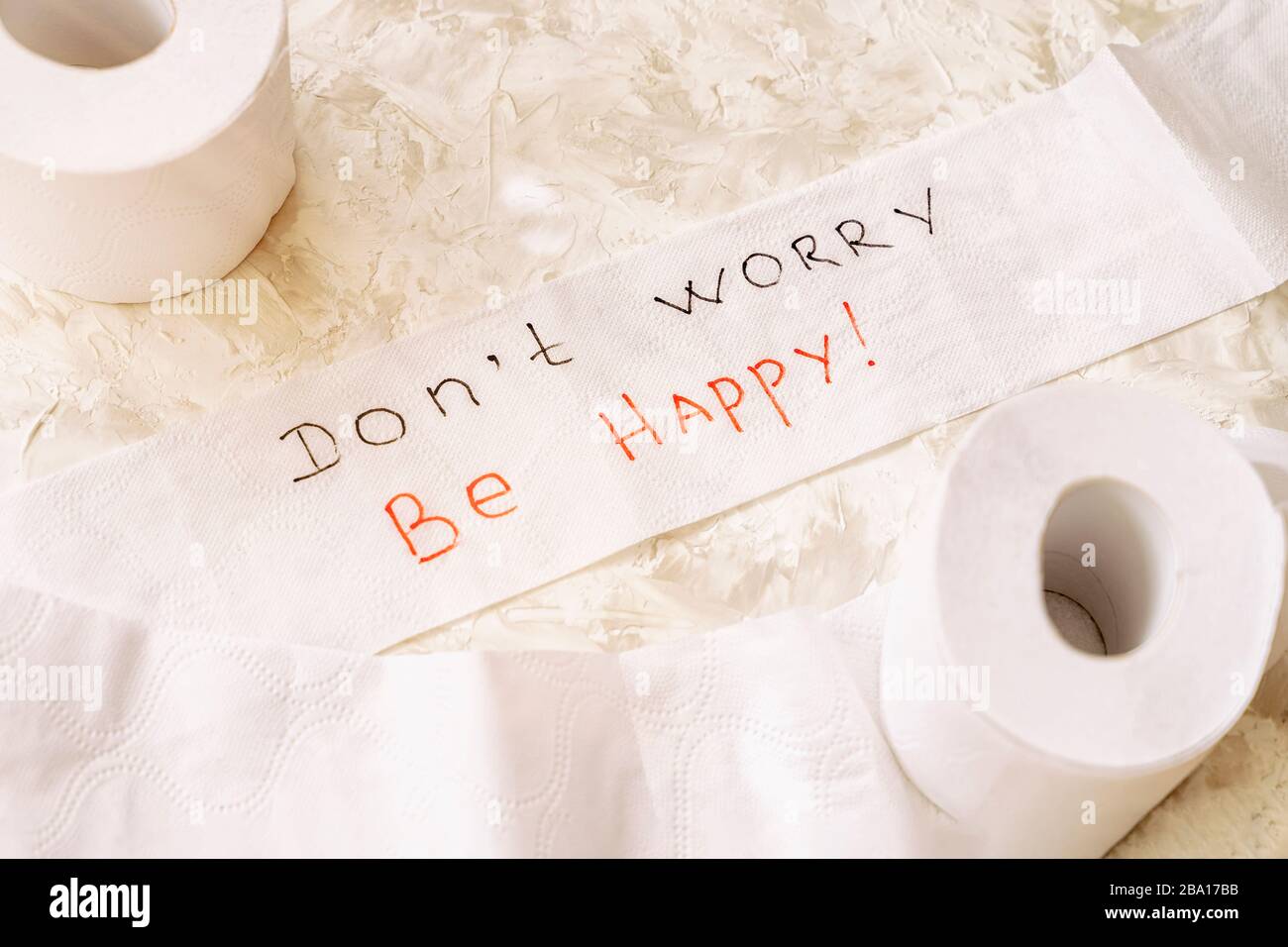 Toilet paper on light background, two rolls, supporting slogan, text