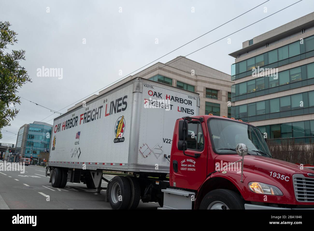 Oak Harbor Freight Lines delivery truck, deemed an essential service business, during an outbreak of the COVID-19 coronavirus in San Francisco, California, March 23, 2020. () Stock Photo