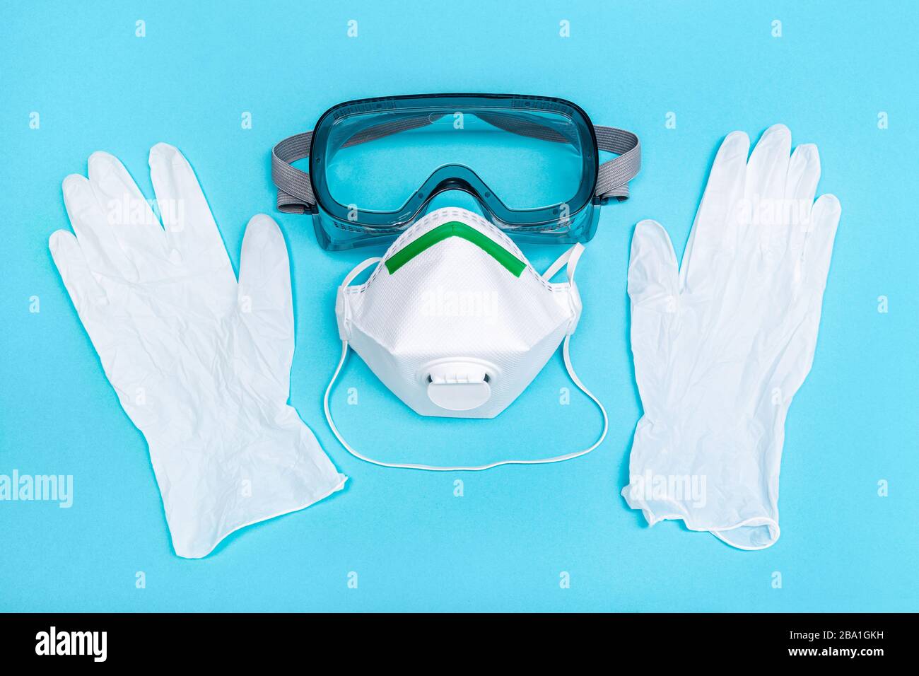 Safety equipment or Protective suit to fight to Coronavirus COVID-19 virus outbreak. Safety mask, protective gloves and glasses Stock Photo