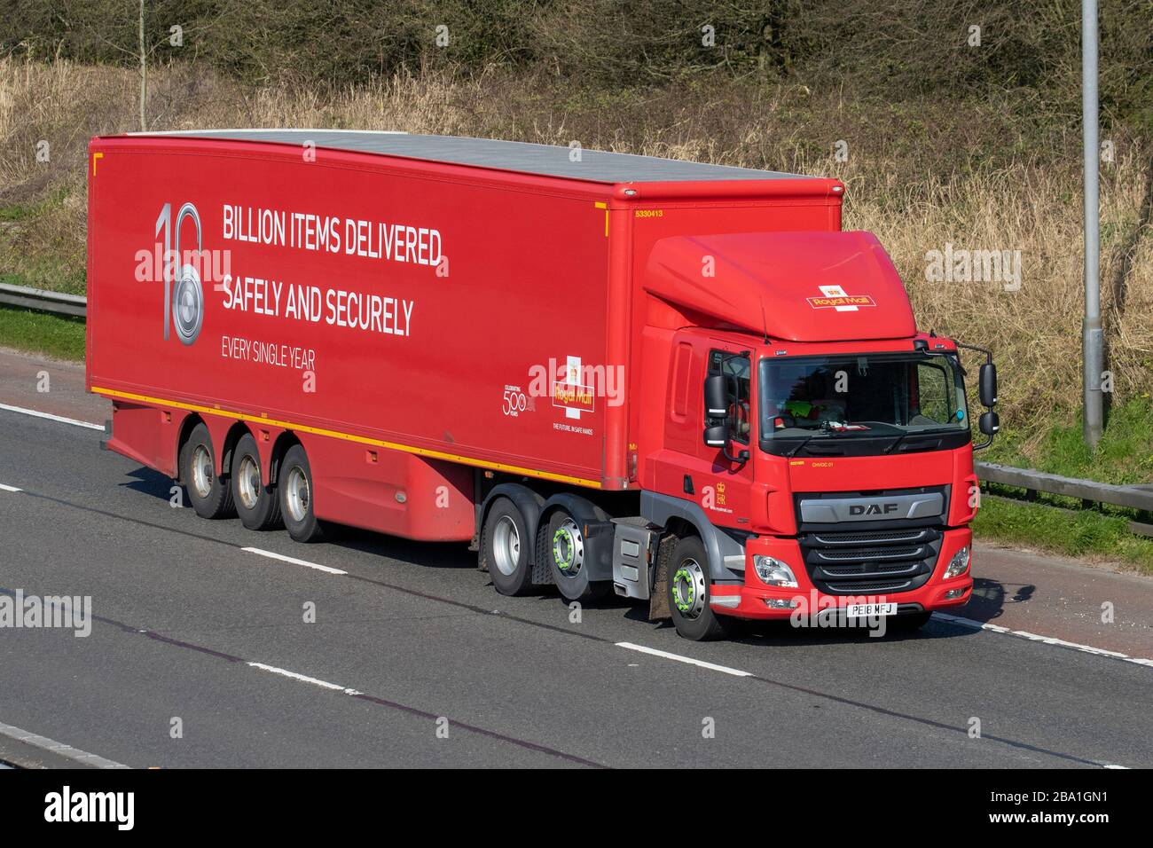 Royal Mail Haulage delivery trucks, lorry, transportation, truck, cargo carrier, DAF vehicle, European commercial transport, industry, M6 at Manchester, UK Stock Photo