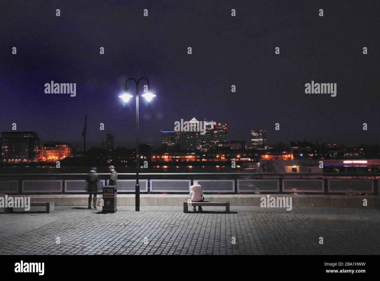 View from Greenwich Embankment overlooking Canary Wharf at Night, London, England UK Stock Photo