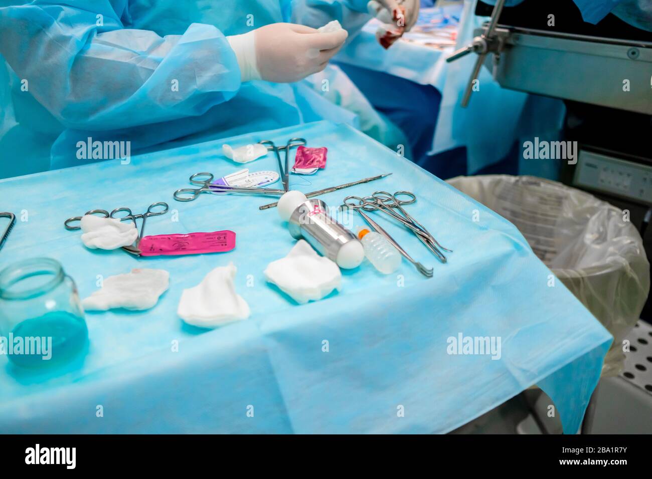 Sterile surgical instruments and glass containers with solutions on the