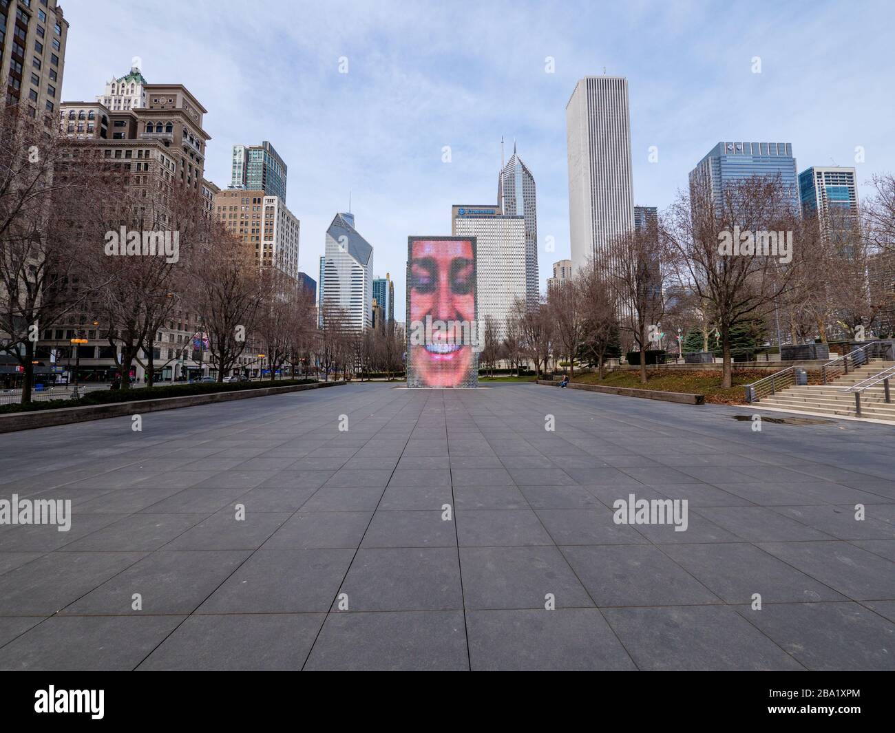 Chicago, Illinois, USA. 24th March 2020. Crown Fountain in Millennium Park, which usually attracts many people is empty today do to the stay at home order in effect. Stock Photo