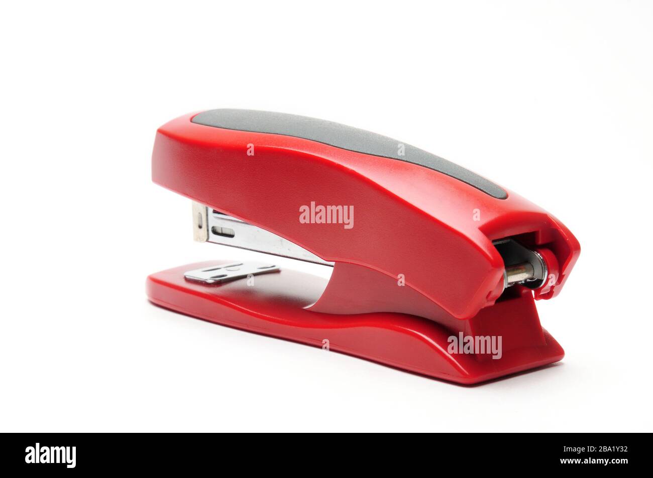 Red office stapler on an isolated white background Stock Photo - Alamy